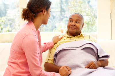 a healthcare worker looking after a senior